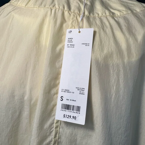 Uniqlo U packable yellow over sized hooded rain poncho. - Picture 14 of 14